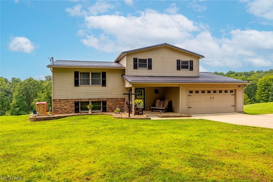 Welcome to this spacious tri-level home that offers ample space for everyone. Step inside to discover new flooring, paint and ceiling fans throughout, providing a fresh and comfortable living environment. Enjoy the serenity of the large yard and countryside view, complemented by a convenient storage building to the right of the property. Double doors on 2 different levels make enjoying the great outdoors easy. Embrace the charm and convenience of this property, perfect for creating lasting memories. Don't miss this opportunity to make this house your new home!