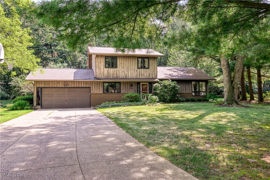 Welcome to 532 Beverly Drive – A Peaceful Retreat in the Heart of Tallmadge!
Set on a serene ½ acre lot, this well-maintained 3-level split offers space, comfort, and convenience in a beautiful mature neighborhood. Step into the inviting wood foyer leading to a spacious living room with an open dining area—perfect for entertaining or quiet evenings at home. The kitchen features a breakfast bar, ample counter space, a large pantry, and all appliances included. Sliders off the kitchen open to a rear wood deck overlooking the peaceful backyard. Just a few steps down, the cozy family room boasts a fireplace and connects to a charming sunporch—ideal for relaxing or enjoying views of the landscaped yard. Upstairs, you'll find three comfortable bedrooms and a fully updated full bath. Fresh paint and neutral decor throughout make this home move-in ready. The lower level includes a rec room, a laundry/utility room, and a large crawl space offering generous storage and easy access. Additional features include an oversized two-car attached garage, well-maintained landscaping with mature trees and perennials, and a private setting on a quiet street. Conveniently located close to highways, shopping, restaurants, and more—this home offers the perfect combination of space, location, and value!