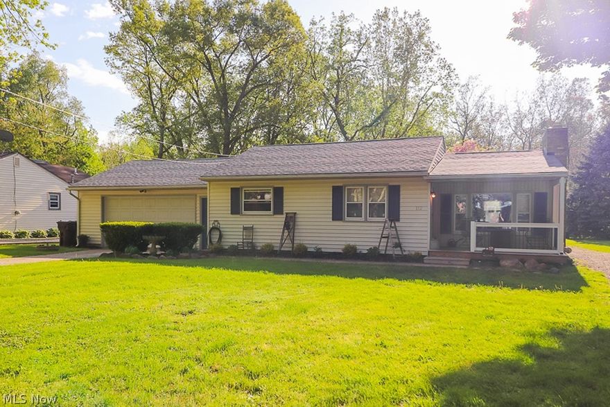 Take a look at this incredible 2 bedroom 1 bath ranch with enough garage space for 5 cars! This home has been updated over the years and offers a large living  room with wood floors, and a natural gas fireplace. The kitchen has been updated as well with newer white kitchen cabinets, counter tops, hardware and flooring. Dining area has wood floors and a large window with views of the front yard and porch. Both bedrooms are similar sized with large closets. The basement is partially finished with a large non conforming bedroom that has carpet and a closet. Also the basement offers tons of storage a natural gas furnace, high efficiency gas water hater and laundry area. The 2 car attached garage leads into the basement and kitchen making unloading groceries easy. In the back yard sits the large 24'x36' shop with its own separate driveway. The shop is nicely finished inside and has electric, heat, water and even a 1/2 bath. This would be a great home for someone that loves cars or motorcycl