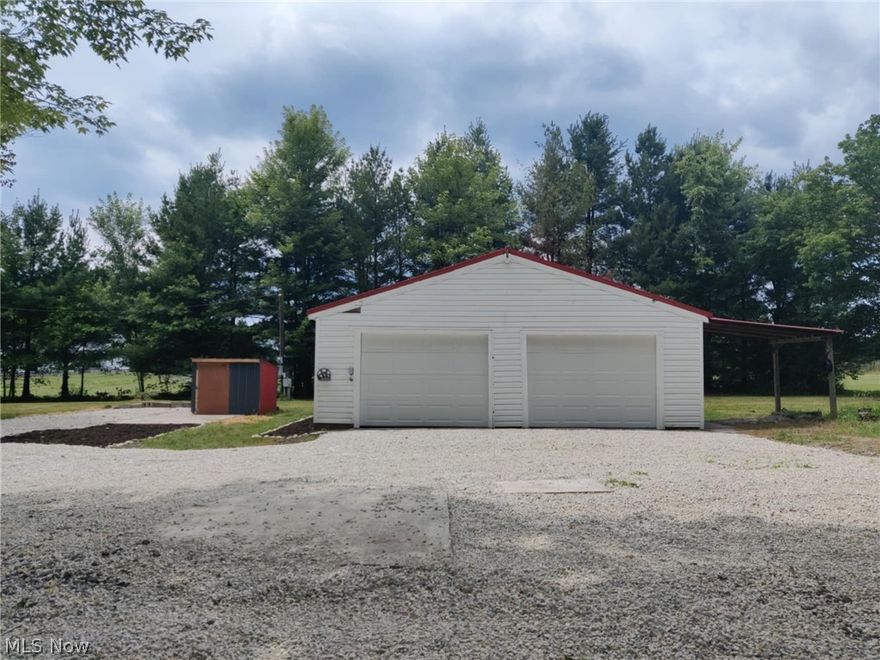 **Unique Property** This beautiful, quiet, country living half acre lot has so much opportunity and potential. Located One Mile from Trumbull County's Beautiful Mosquito Lake, Down the road from Trumbull County Fairgrounds, all in Bazetta Township in the Lakeview Local School District! This residential lot features a fully renovated 2 car garage and a newly graveled driveway with 2 pads for your Camper or RV. Each area features a BRAND NEW DUAL RATED RV Electric Hookups with both 30 and 50 amp service. The garage features new drywall, new hot water tank, all new plumbing, with RADIANT FLOOR PLUMBING, many electrical updates, two new garage doors, LED Shop lights and a metal roof. Drainage ditches were installed, along with a well house built with full electric. Come use this as your very own Getaway spot or Build your Dream home! Property already has Electric and Water ( WELL) and gas available and onsite ( not currently turned on). Don't miss out on this rare property!
