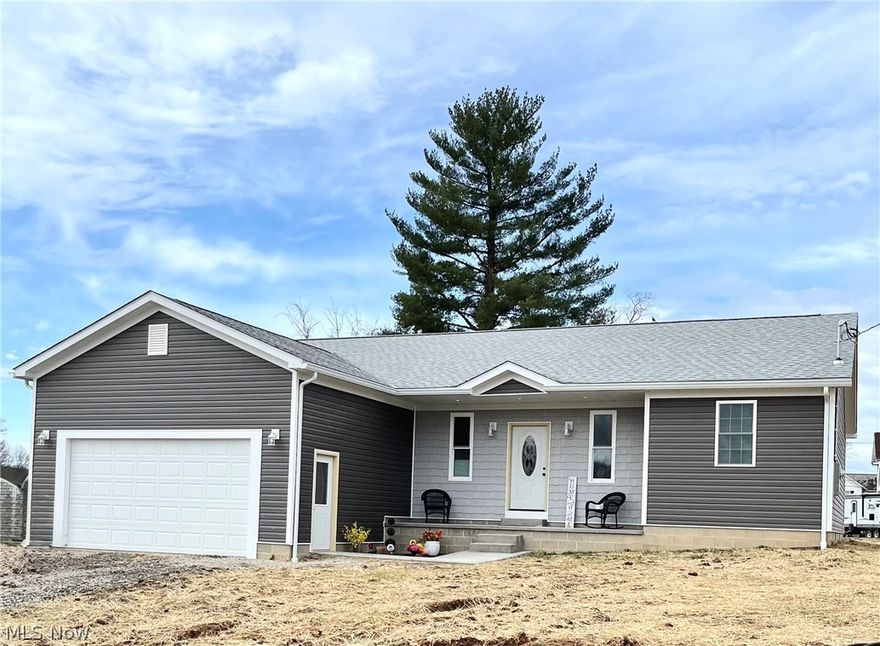 Beautiful new construction ranch featuring 3 bedrooms, 2 full baths, 2 car garage with convenient alley access. This move-in ready home offers an open concept layout with a split bedroom design that separates the master suite from the guest bedrooms for added privacy.

Interior highlights include tray ceilings, vaulted ceilings, recessed lighting and quality craftsmanship throughout. The kitchen, bathrooms and utility room all feature tile flooring adding both style and easy maintenance.

Enjoy a spacious backyard perfect for relaxing or entertaining. Located in the Warren School District.
This home offers comfort, functionality and modern design in a desirable setting.