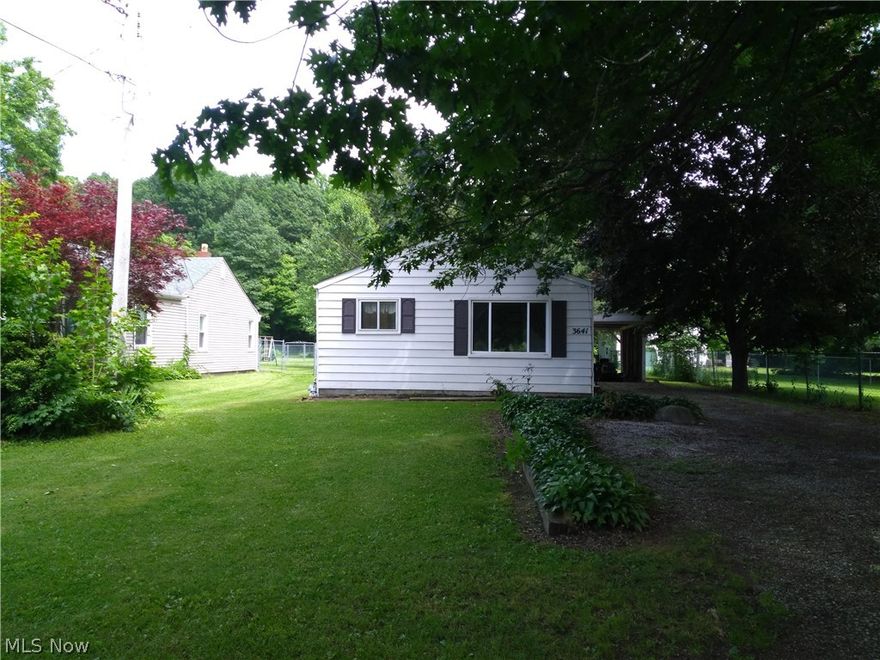 This adorable ranch sits off the road and has great privacy. The home features a nice size kitchen and dinning area with 4 bedrooms and 1 bathroom. The home has over 8 acres in Perry! Very nice lot with fertile sandy soil. Great potential.