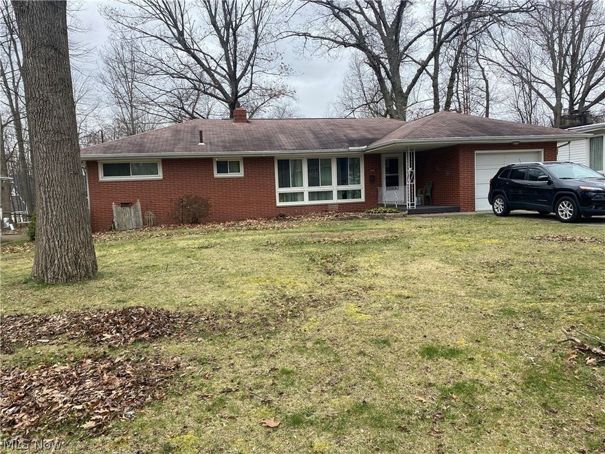 Welcome to your dream home nestled in the heart of Perry, offering a perfect blend of modern amenities and cozy charm. This inviting 3-bedroom, 2-bathroom residence boasts a walkout basement and newer windows that flood the interior with natural light, creating a warm and welcoming atmosphere. Step inside to discover elegant wood floors throughout the first level, adding a touch of sophistication to every room. Enjoy the serene backdrop of beautiful woods behind the home, providing a peaceful retreat from the hustle and bustle of everyday life. Ample built-in storage solutions in both the basement and kitchen ensure that organization is effortless, while the convenient washer/dryer hookup in the basement, along with plumbing for an additional unit upstairs, makes laundry day a breeze. Plus, for added peace of mind, this home comes with a one-year home warranty, offering you worry-free living from day one. Don't miss your chance to make this exceptional property your own – schedule a showing today and experience the perfect combination of comfort, convenience, and style!