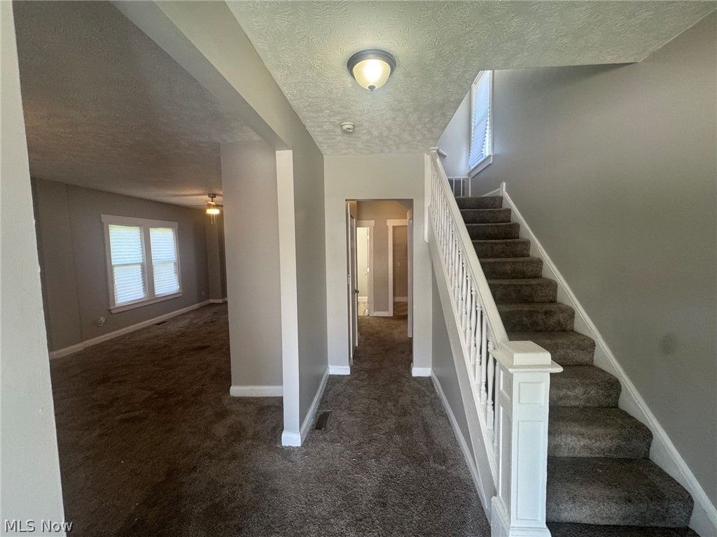 Photo of 9710 Easton Avenue, Cleveland, OH 44104 (MLS # 5211751)