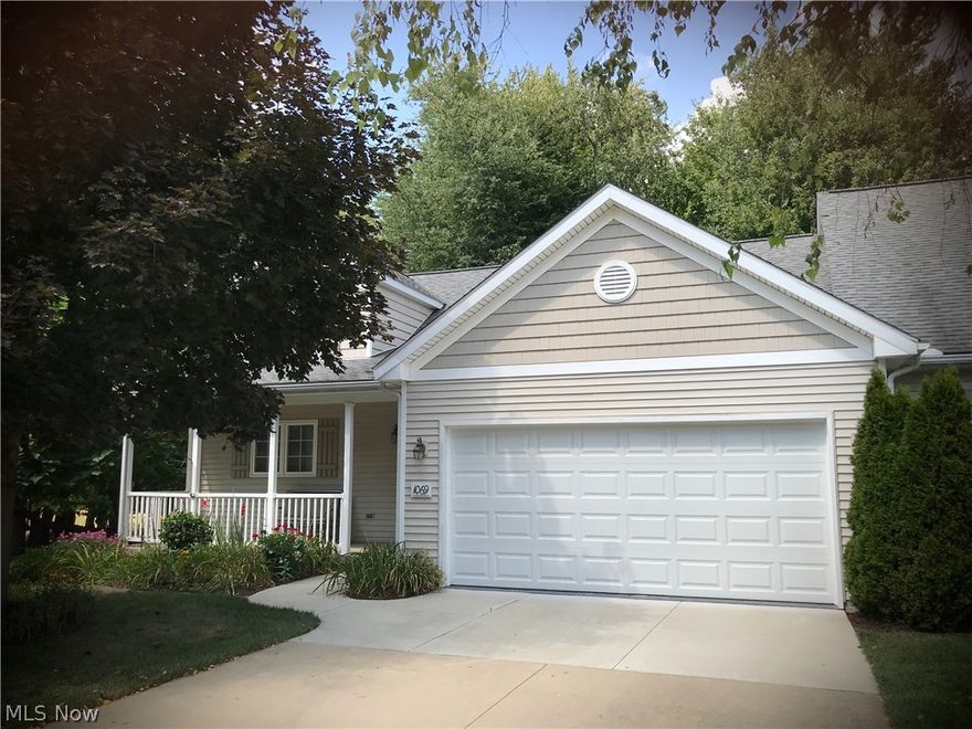 Welcome Home to Kent, Ohio's beautiful Cottage Gate condo community, the hidden gem of condo living. This 2BR, 2BA Cape Cod (New Englander) feels like it's a million miles from nowhere when you are inside it with lawn, wood and water views surrounding this end unit on a cul de sac ! There's scarce availability in this fully-developed & affordable condo neighborhood with ponds, well-groomed beds, lawns, curving sidewalks, concrete drives, rolling landscape plus wonderful common area adjacent to the condo. Unit 1069 Cottage Gate Drive boasts Generous Loft (which can be converted easily to a third bedroom) above the huge vaulted great room, New Furnace & Central A/C (both in 2019), a full walk-out basement (unfinished for your creative finishing & added value upon completion), east-facing front porch, & two very sizable bedrooms: Master on the first floor and large bedroom on the second. There is a full bath on each floor plus utility half bath in the lower level! First floor laundry righ