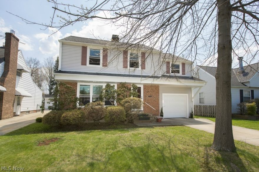 Gracious and spacious this 3 bedroom 2.5 bath, colonial offers a balance of great space and significant updates. A partial brick exterior adds charm and curb appeal to this 1943 sq. ft. home.   Large, bright and inviting living room with stately fireplace, adjoining formal dining room share beautiful hardwood floors.  Tasteful updated well planned kitchen with maple cabinetry, black appliances, ceramic 12x12 tile flooring.   Kitchen was opened to dining room during renovation, includes skylights, with a full wall of glass opens this space up!  Lending warmth and extends to the comfortable outside patio to unwind.  A first floor in-law suite with an on-suite full bathroom featuring a super size shower was part of the addition.   A hard to find half bath off the kitchen completes the first floor.  Main full bath on second floor has been updated,  all bedrooms are generous in size and have good sized closets.  Freshly painted in todays colors, meticulously maintained home truly move-in re