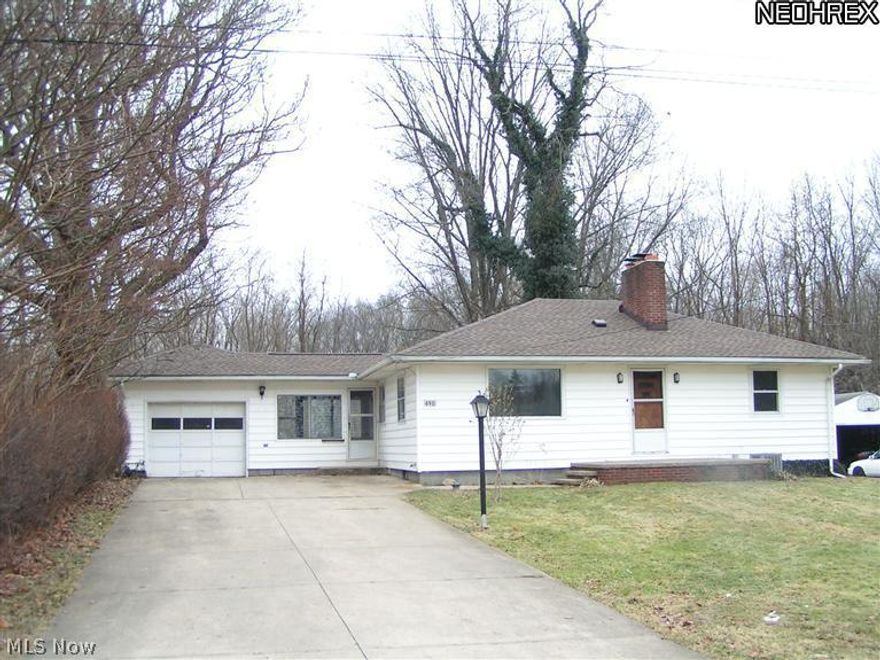 In the heart of Portage Lakes and just walking distance to the Portage Lakes State Park w/a public boat launch & lake access (see photos)!  Huge kitchen w/ ceramic flooring and a big, beautiful wood burning fireplace in the living room.  Plus new carpet, updated electric and well, w/a new roof, furnace, a/c and glass black windows--all less than 5 years old. Attached 2 car (extra deep) tandem garage. An awesome back yard with patio that is private and spacious, located on a dead end street! Super close to the awesome lake(s)! * Coventry local school district*