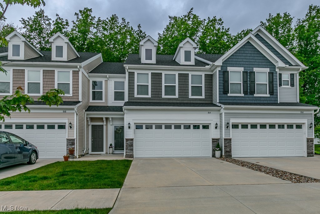 No need to wait for new construction—this Parkway Crossing townhome is move-in ready and was just built at the end of 2020! The open first floor makes entertaining easy, with a beautiful kitchen that features quartz countertops, plenty of cabinet space, and all stainless steel appliances included! The living room has a cozy fireplace, and the upgraded sitting area is perfect for your morning coffee. New remote-control blinds on the first floor make it easy to adjust the light throughout the day. Upstairs, the owner's suite has a huge walk-in closet, a tiled shower with a bench, and an upgraded quartz vanity. There are two more bedrooms, a spacious second full bath, and laundry room on the second floor for ease. Outside, the landscaping was just redone, and recently added a brand new back storm door. Modern finishes, neutral paint, and updated light fixtures throughout make this home feel fresh and current. Close to shopping, Crocker Park, Westlake Rec Center, dining, and the highway—this is one you don’t want to miss! All this and the home comes with a 1-year warranty! Call today for your private showing as this one won't last long!