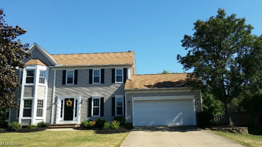 Beautiful, updated and move in ready 4BR, 2.1BA Colonial with full, finished lower level, 32x21 two-tier deck w/bench seat all overlooking dreamy 6' privacy fence in rear yard complete with sidewalks, street lamps and immediate access to absolutely everything.  Home features inviting two story hardwood foyer, formal hardwood dining room, eat-in kitchen w/double window/plant shelf above sink, new stainless steel appliances, oversized island and extra large pantry.  Bayed dinette, tiled 1/2 bath.  Home includes bayed owner suite/retreat w/waist-high dual vanity glamour bath w/skylight, 3 additional good size bedrooms along with 2nd tiled full bath in hall.  Enormous 36x26 rec room and possible 5th bedroom/arts/crafts room.  Over $30k in improvements: 95% furnace, 17 seer c/a, humidifier, Simonton full tear windows, Anderson slider, resurfaced kitchen cabinets, refinished all hardwood floors on 1st floor, carpet, paint and more.  This home truly has the best of all worlds.