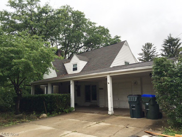 This property has loads of potential. It is situated on almost an acre. Beautiful trees and home has lots of charms. This seller was also told by the city that this parcel could be divided easily into 5 building lots. The home needs some mechanical and cosmetic work to bring it to its original "good looks." There is an attached 2 car garage, plus a detached 2 car garage on property.