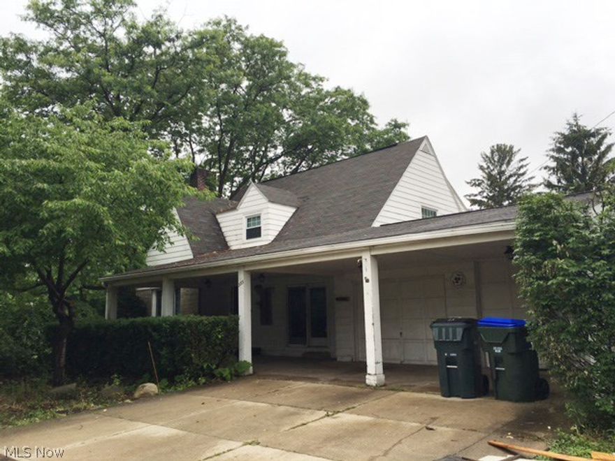 This property has loads of potential. It is situated on almost an acre. Beautiful trees and home has lots of charms. This seller was also told by the city that this parcel could be divided easily into 5 building lots. The home needs some mechanical and cosmetic work to bring it to its original "good looks." There is an attached 2 car garage, plus a detached 2 car garage on property.
