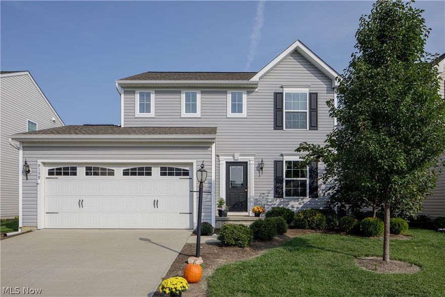 If you'd like to live in a space that looks like HGTV home with all the current colors and decor buyers are seeking, here it is! Located in the Waterbury Development in the North Ridgeville School District, this 3 BR 2.5 BA, 2150 sq. ft. home is near Avon Commons and Crocker Park.  The 2 story Colonial has an open concept main floor with a large kitchen, stainless steel appliances, dining room & living room - all with updated flooring.  There's also a powder room and laundry room on the first floor.  Upstairs is the spacious master bedroom and master bath plus 2 additional bedrooms and bathroom.  The basement has been partially finished for additional living space. The new owners will have access to the clubhouse, pool, playground and walking path.  Everything you need is right here! Call & set up a showing now!