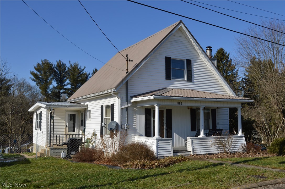 Comfortable 3 bedroom, 2 full bath home, situated on a large double lot in Middlebourne. The first floor features a large living room with wood/gas fireplace, master bedroom with walk-in closet, eat-in kitchen with large pantry, separate dining room, a full bath, and laundry hookup. The second floor has two bedrooms and a full bath. Beautiful original oak woodwork throughout. The walkout basement includes a finished family/rec room and a canning kitchen. Outside is a 22' X 22' detached 1.5 car garage, garden shed and fenced yard. Plenty of storage inside and out. Metal roof installed in 2015. This 1477+ sf home is much larger than it appears. Located in a great neighborhood, close to the park. Come see for yourself.