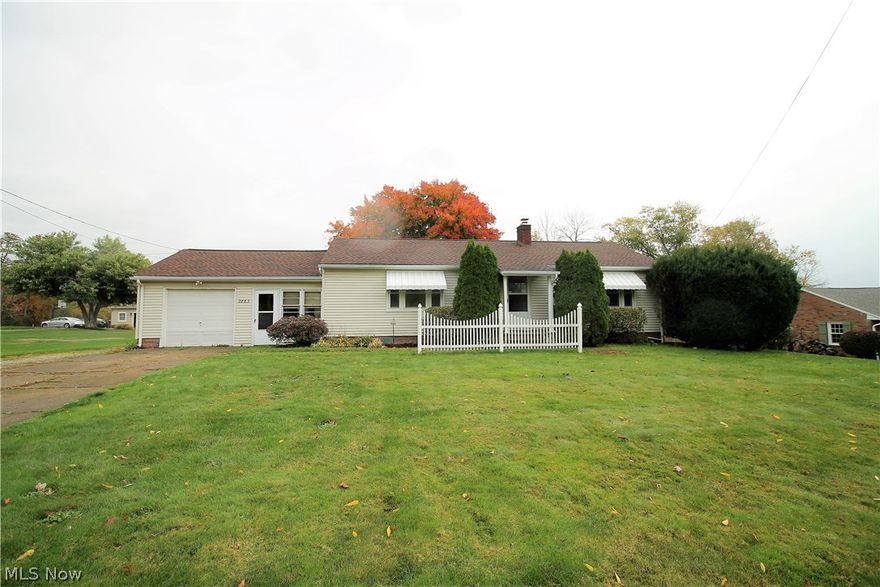 Precious memories begin right here! Welcome home to this charming two bedroom, two full bath ranch home on half an acre lot. Come on into this inviting and cozy family room with large windows to let the natural light shine through, which is open to the eat in kitchen, two bedrooms and full bathroom all on the main level. The large kitchen offers newer stainless steel appliances (2019), an abundant of cabinets and drawers, counter space. There is a window seat with a large window that offers more sunshine and view of the fabulous backyard. There is a full bathroom with a closet and plenty of room for storage. Two large bedrooms, one with new carpet (2020) that finishes the main level. The lower level has a recently finished basement with bar and newer carpet, laundry area with newer well system, bonus room that could be used as a third bedroom, office, etc that has walk in closet and full bathroom. The large tranquil backyard is all open with a wooded view and has a shed.  So much room