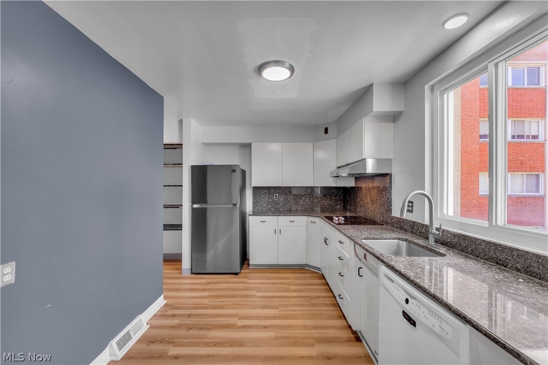 16100 Van Aken Boulevard 303