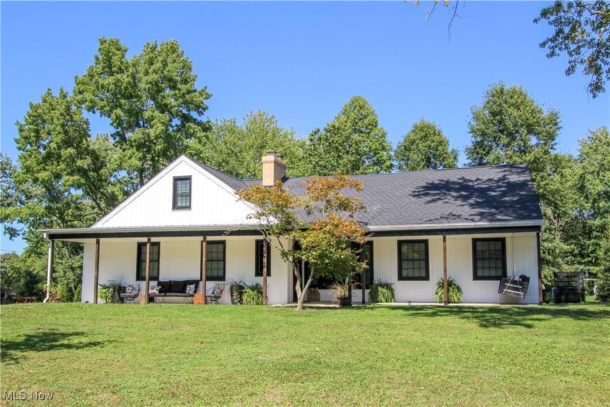 Larger than it appears from the street, this charming home has been thoughtfully reimagined with today’s buyers in mind. It beautifully preserves classic features while seamlessly blending practicality, functionality, and timeless charm. Upon arrival, you are greeted by an inviting front porch, perfect for enjoying a morning coffee. Step inside to discover a beautifully updated interior featuring a spacious living room with two large picture windows and a cozy wood-burning fireplace. The heart of this home is the expansive great room, open to the gourmet kitchen and dining area. This striking space boasts vaulted ceilings and a stunning gas fireplace, creating a warm and inviting atmosphere ideal for entertaining and family gatherings. The kitchen with its sleek finishes and contemporary design, features two islands, quartz countertops, a prep sink, and a walk-in pantry. Adjacent to the living room, you'll find an office and the luxurious primary suite. This serene retreat offers vaulted ceilings and access to a glamorous bathroom complete with a walk-in shower, dual vanity, large soaking tub, and a walk-in closet. The main level also includes a workshop, mudroom area, and a convenient half bath. Upstairs, you'll find three additional bedrooms, two bathrooms, and a versatile loft area perfect for additional relaxation or play. Outside, the home offers a screened-in porch, a tiered patio, and a shed, all set within the award-winning Aurora School District and close to shopping, restaurants, parks, and more. Come see what this exceptional home has to offer!