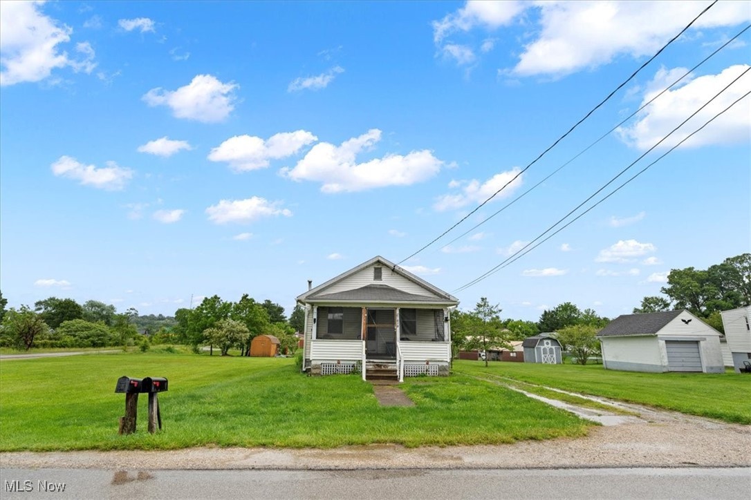 Welcome to this 2-bedroom 1-bath home that is waiting for its new owners to pour some love into! This property is located on a corner lot in South Parkersburg that includes 3 separate parcels totaling 0.51 acres of flat green grass! It has a screened-in front porch, a full unfinished basement, and plenty of parking along the driveway met by the 1 stall detached garage. Call for your showing!