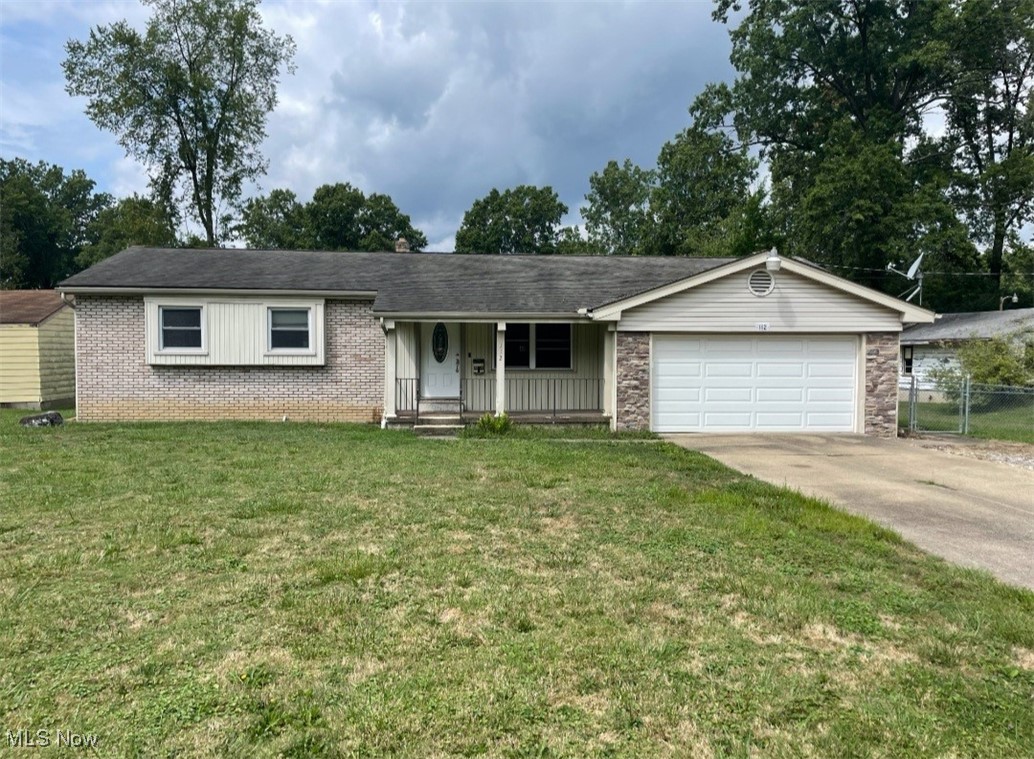 This brick, vinyl, and stone ranch has plenty of potential. Features living room, eat in kitchen with appliances, and 2 family rooms. One and a half baths. Central air. Full basement. 2 car attached garage with opener. Double driveway with plenty of parking. Fenced in side yard. Super nice front porch and much more. Won't last, diamond in the rough.