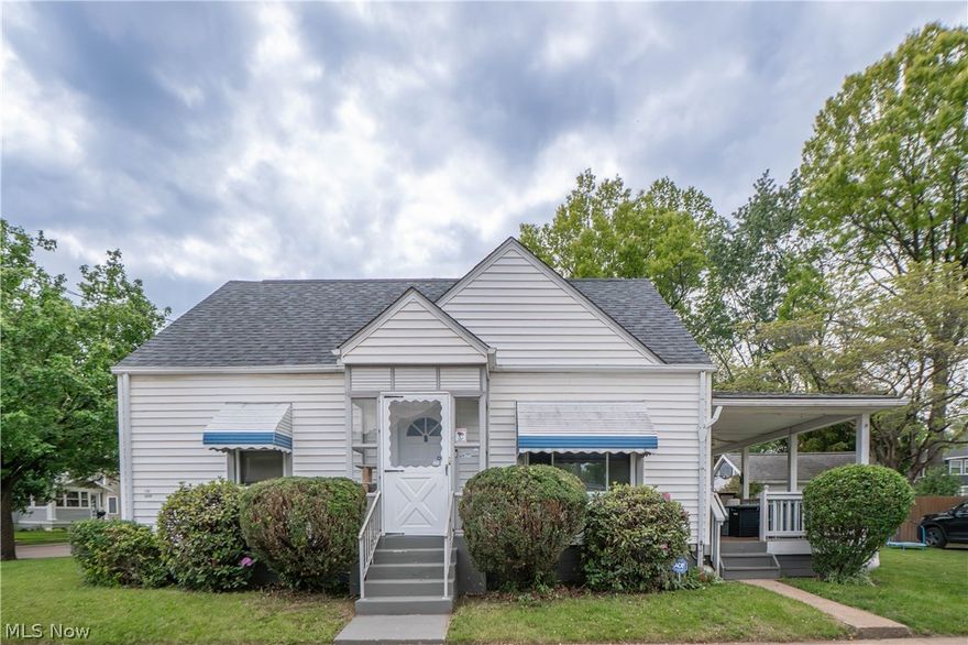 This charming Cape Cod sits on a great corner lot and offers a comfortable layout with updated mechanicals, extra parking, and inviting indoor/outdoor living spaces. Step inside through the enclosed front porch and into the cozy living room, where natural light creates a warm first impression. The eat-in kitchen features painted cabinetry, laminate flooring, a gas range, new faucet, and direct access to the large covered side porch—complete with a ceiling fan and bar area, making it a great spot to relax or entertain. Two bedrooms are conveniently located on the main level along with a remodeled full bathroom offering a shower liner and sink with storage. Upstairs, a spacious loft-style third bedroom provides an extended closet and its own private half bath. The lower level adds even more usable space with a finished recreation room, laundry area, utility sink, and plenty of storage. Furnace, central air, and hot water tank were all updated in 2025 for added peace of mind. Outside, enjoy the deck, 1-car detached garage with storage space, garage opener, and additional off-street parking. A wonderful opportunity with practical updates and flexible living space!