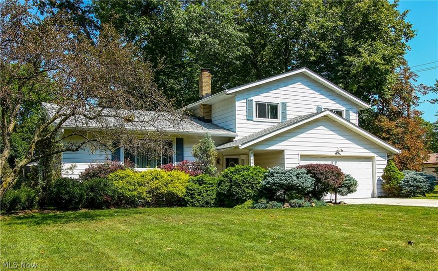 Rare split with a finished basement.  Spacious rooms  include a living room and dining room open concept with vaulted ceilings.  Large eat-in country kitchen overlooking the family room with sliding patio doors to a nice patio. Entire home recently painted with neutral colors.  Plenty of room in the bathroom with double sinks, no need to share. Half bath on the first floor for guests while you are entertaining.  Easy maintenance aluminum sided home with attached garage and newer concrete driveway. Sprinkler system so you can keep your yard looking good even when you aren't home. Priced to sell quickly!