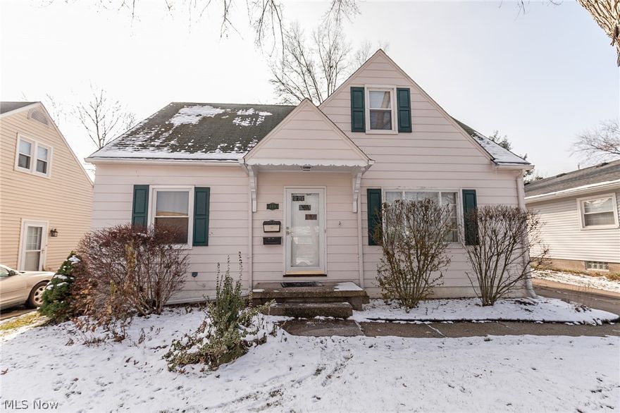 A wonderful Cuyahoga Falls bungalow with 3 bedrooms and 1 1/2 baths and a 2 car garage.  With over 1600 sq ft of total living space, this lovely home features a 33x11 Family/Recreation room in the finished, and waterproofed, basement, with a bar and still ample storage.  A large living room has plenty of natural light.  The eat in kitchen has been remodeled.  The entire upstairs is a master suite with 1/2 bath and sitting area.  The  many updates include kitchen, baths, furnace (2015), a/c (2015), electric (2015), hot water tank (20150, vinyl windows, and more.