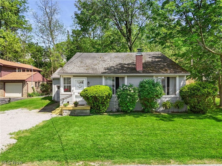 Location, location, location!  This isn't just a home, it's a whole community!! This quaint bungalow is just begging to be brought back to life!  The open living room with cozy wood burner and hardwood floors is so charming and leads to the enclosed side porch where you can enjoy fresh air and lake breezes 3 seasons of the year!  The 2 bedrooms on the main floor are spacious with wonderful closet space, and the partially finished upstairs is added square footage for additional bedrooms or to create a whole suite and add instant value! As a member of the Chagrin Harbor Beach Association, you’ll enjoy incredible amenities for a low annual fee: private beach access, a kayak launch, playground, clubhouse rentals for special events, and even available dock slips. From community parades to wacky boat races, this neighborhood thrives on connection and fun. Don’t miss this opportunity to make this house your own and become part of a vibrant lakefront community where life feels like a permanent getaway. Don't miss the chance to create a great return on an investment, schedule your private showing today! Selling AS IS.