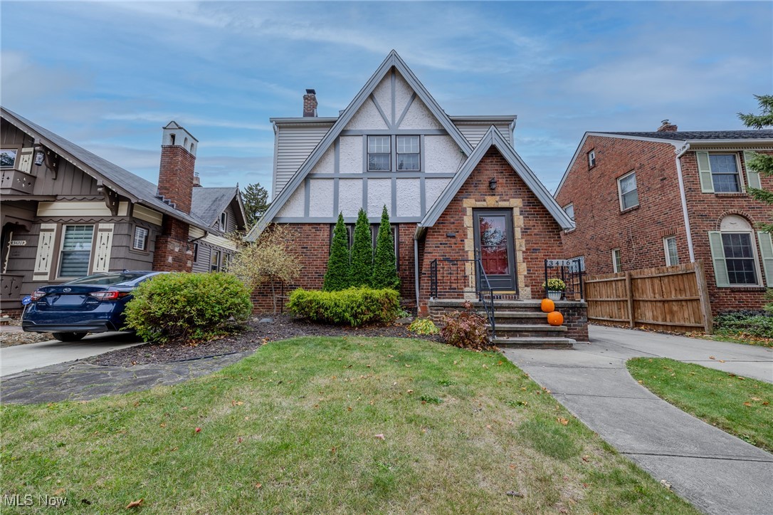 Discover the perfect blend of classic elegance and modern convenience in this stunningly renovated Tudor-style home, nestled on one of the most picturesque streets in the desirable West Park neighborhood of Kamm's Corners. This charming residence boasts a harmonious mix of historic character and contemporary features, highlighted by a freshly painted warm color scheme and beautifully refinished hardwood floors in a deep walnut finish.
The traditional layout has been reimagined for today's lifestyle, creating a more open and inviting floor plan. The completely renovated kitchen is a chef's dream, featuring exposed brick, shiplap accents, open shelving, sleek cabinets, granite countertops, stainless steel appliances, and a breakfast bar that seamlessly connects to the formal dining room. The dining area offers easy access to the deck, making it an ideal space for entertaining.
Natural light floods the spacious living room through large windows, enhancing the warm and inviting atmosphere. Upstairs, you'll find three well-appointed bedrooms and a stylishly updated bathroom with a relaxing jacuzzi tub. A private entrance leads to the third floor, which features a cozy sitting area and a staircase that ascends to a secluded fourth bedroom!
The lower level includes a carpeted rec room, a full bath, a laundry room, and plenty of storage options. The basement has been waterproofed for peace of mind, and a detailed list of upgrades is available. Don't miss your chance to see this exceptional home contact us today for a private tour!