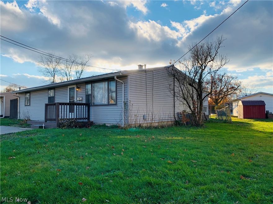 Open today 12/23 from 12:00 noon to 1:15 pm & again on 12/30 4:00 to 5:30. Just reduced. Lots of good times packed into this little but mighty ranch home!!  The kitchen is a really attractive feature and includes Stove & Refrigerator.  Currently has been used as a 2BR .......because  owner converted tandem third BR into a LARGE closet plus storage room.  First Floor Laundry includes Washer/Dryer. Furthermore, you may step from the Kitchen into the 4-season room. Multi-purpose room or just go and slip away to hide there or enjoy the Sunset. Also, outside you have a deck for Barbequing in your fenced back yard.  Yes the storage shed can stay. Now, for those of you who have a true appreciation of a "real" two-car Garage, here you go.   Yes it has Water / Drain / Electric / Door Opener and extra outside concrete parking.  Check the photo. It looks good!  Enters from the "back street". A 24-Hour Video-Security System remains.