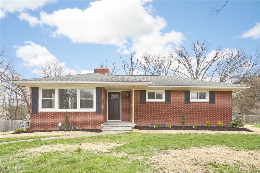 Welcome home to this beautifully updated 3-bedroom, 2 full-bath brick Ranch tucked away on a dead-end street, just minutes from the expressway, Portage Lakes, and Firestone Golf Course. Step inside and be wowed by the fresh luxury vinyl flooring, new carpet throughout, and stylish new front door that sets the tone for the entire home. The heart of the home is the stunning remodeled kitchen, featuring granite countertops, crisp new white cabinetry, and stainless steel appliances, perfect for cooking and entertaining. Enjoy the warmth and charm of two wood-burning fireplaces in the living and family rooms. Both full bathrooms have been fully remodeled with modern finishes. Outside, you'll love the freshly landscaped yard and brand new patio, perfect for relaxing, grilling, or entertaining guests. This solid, single-story home offers comfort, style, and a prime location. Truly move-in ready with nothing left to do but unpack and enjoy! Don't miss this one; schedule your private showing today!