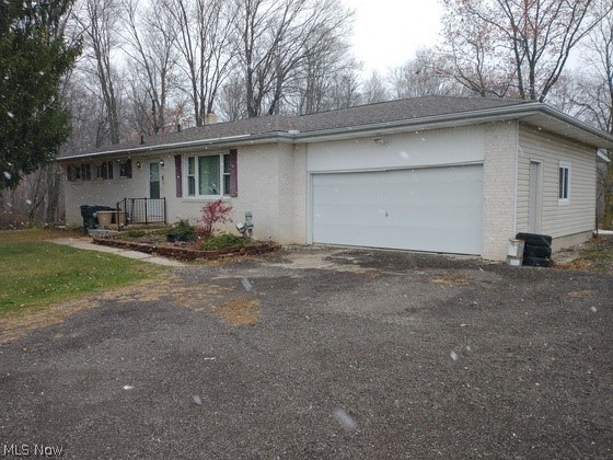 Looking for a country property? Looking for a place to hunt? Looking for a place to fish? This may be the property you are looking for. The following property known as parcel #22-00209.000 consist of a Ranch house built in 1971, 2 bedrooms, 2 full baths with Handi-Cap toilets, full basement, kitchen, living room, family room which has a wood burning burner, 1188 sq. ft. living space, covered porch on the back side of the house, brick on the front of the house and vinyl siding on balance and sits on 4.55 acres. There is a stocked pond, wooded area which has a stream running through it. On the outside there is a 18’ X 28’ pole building, 8’ X 10’ chicken house and a underground storage/fruit cellar building, fruit & oriental trees, Taxes per half under Homestead are $1032.96 per half and is located in the Northwestern LSD. Within the past 10 years updates consist of windows, roof, gutters, storm door, heat pump, water softener, water tank & stove top. TERMS ON REAL ESTATE-Register for bid