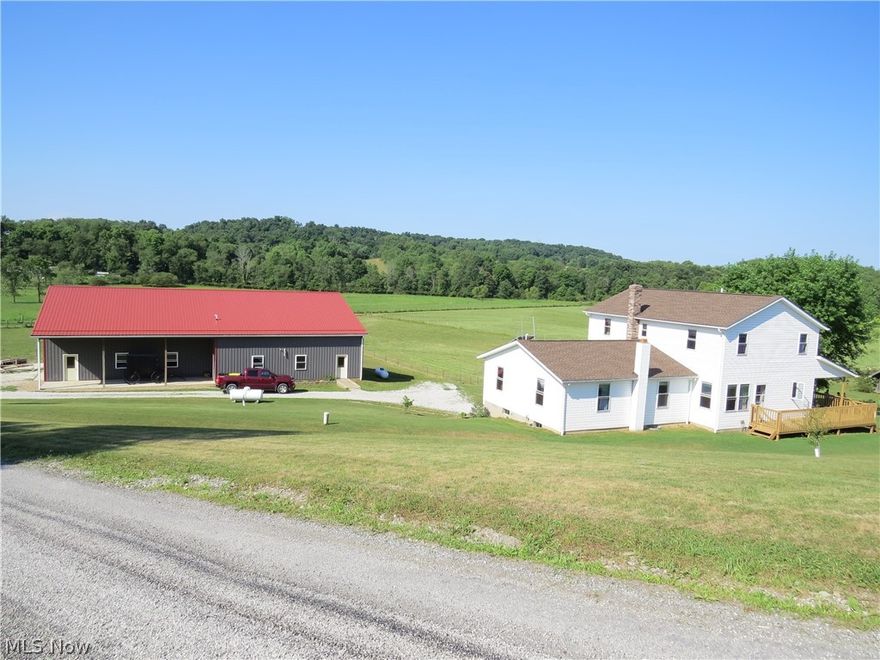Amazing 27 Acre Carroll Co. Horse or Livestock Farm! Here's a quality built 6 bedroom, 2 bath home built in 2013 with full walkout basement that won't disappoint. The home features a fantastic Amish custom built hickory kitchen with pantry and pull outs, large living room with hickory flooring, fireplace hookups in the basement and 1st floor levels, covered porch overlooking the 3 fenced pastures, and wood storage under the porch. Part of the house was already here and was gutted and added onto. There is electrical wiring roughed in the walls for future hookup. The horse barn is 38x140, and the owner also built an amazing 50x80x16 metal shop bldg in 2016 with 2 overhead 14x14 doors. The bldg has a 40x40 garage area and 40x50 insulated shop area with office and all finished with steel siding. This bldg has heated concrete floors and is powered by solar system and heated by propane. This bldg would be adaptable to so many different uses including big trucks. The property is not currently