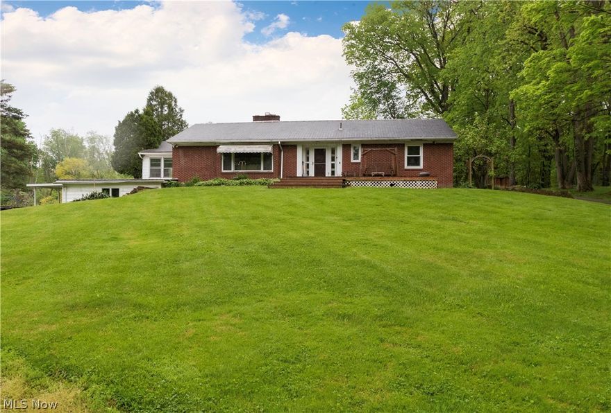 Have a look at this beautiful Ranch Home located on South Ave in North Lima.  The house sits on a beautiful 6.3 Acres and has a large front porch where you can sit and enjoy the sunset or country style setting.  House sits back 500Ft from the Road.  This home Features a Large Living room with Fireplace and recessed lighting, Kitchen has tile floor, refrigerator and dishwasher.  First floor Master with an attached master bath.  The second bedroom on the main floor has it’s own bathroom right outside the door.  Large entryway into the house with bookshelves and a built-in desk.  Home is heated with a Clayton wood burner w/ fans to disperse the heat.  Also equipped with an oil back-up system.  Newer well bladder and water softener, Basement fireplace, multiple rooms have been partitioned as they were once used as additional bedrooms and a 3rd full bath are in the basement.  South Range Schools Call for your private showing today!