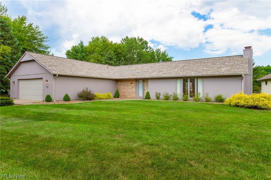 Beautiful and very spacious ranch home in the desirable Meadowood community! One floor living at its finest. Large great room with featuring floor to ceiling windows and a wood burning fireplace, surrounded by gorgeous built-in bookcases. Tiled foyer and entryway lead into the eat-in kitchen, with tons of cabinetry and counterspace.  There are three spacious bedrooms with ample closet space and built in wardrobe chests. The master suite includes a fantastic walk-in closet and full bath. Off of the spacious two car garage is a mudroom and laundry area. Big ticket items including central air and hot water tank have all been replaced in the last five years. The community offers an Olympic size swimming pool, clubhouse, and tennis courts. Move right in and with a little updating you can make this already beautiful home one of a kind!