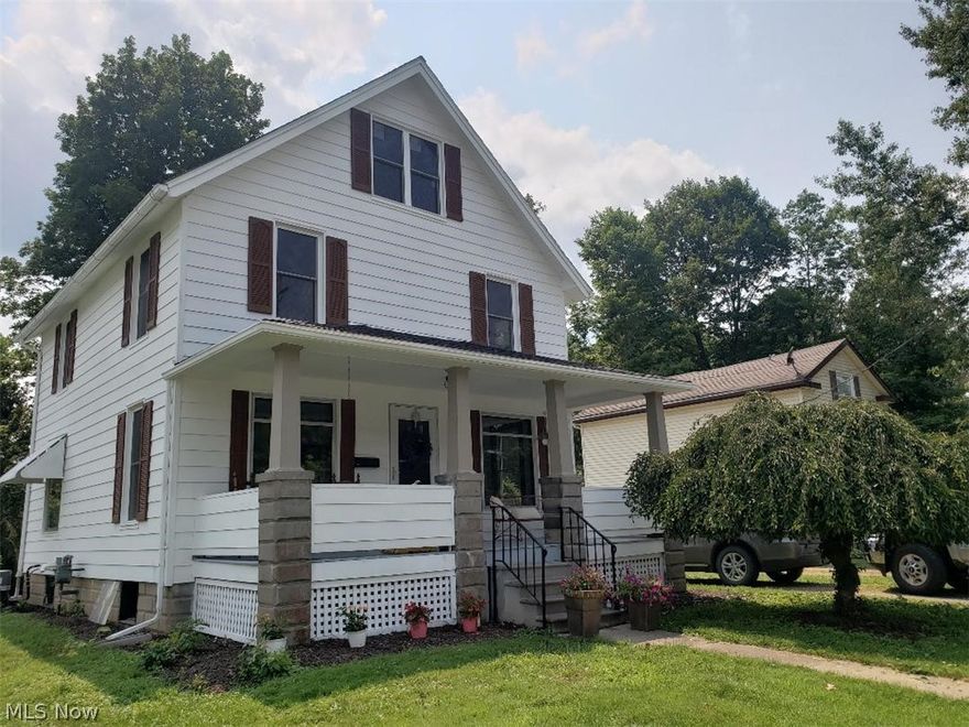 Beautiful and Nostalgic!  Step in to this completely remodeled century home.  All original hardwood floors, wood trim, doors and stair case.   All new electric throughout the entire home.  Upgraded the home to gas service.  Brand new Gas heat furnace and central air.   Kitchen has new cabinets, walls, fixtures, granite counter tops and sink(on back order, to be installed in two weeks).  New interior drywall added to entire home.  Bathroom has new laminate flooring, ceramic tile bathtub and all new fixtures.  Laundry room added upstairs with new laminate flooring and stackable washer and dryer.  The exterior has all new paint, brand new windows and new roof.  There is a second washer and tub in the basement.   The exterior has a newly painted front porch to drink your morning coffee and reflect.  Back porch for grilling.  The house has a exterior barn that was once a carriage house.  Listing agent is the part owner.