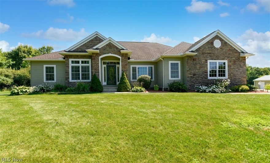 Custom Built Ranch Home on 5 Acres in Lafayette Twp. Medina! Spacious open floor plan perfect for entertaining! This home has 9- and 10-foot ceilings and a tray ceiling in the formal dining room. The kitchen includes Corian countertops, a pantry, and a large island. Staggered cherry cabinets complete this large open kitchen. The kitchen opens into the great room with gas fireplace and office nook. Exit out to the 624 sq. ft. covered patio, perfect for outdoor dining and gatherings. Explore the nearly 5 acres of lush grass and partially wooded lot. Bring your toys and fill up your 24 x 32 pole garage! Just off the attached garage is your laundry/mudroom with storage and handy utility sink. Owner's suite complete with walk-in closet and spacious bath with a double vanity, jetted soaker tub, and a walk-in shower. The full basement has a huge finished recreation room, plenty of storage space, and three bonus bedrooms for your guests. Call today! Virtual walkthrough video https://youtu.be/N