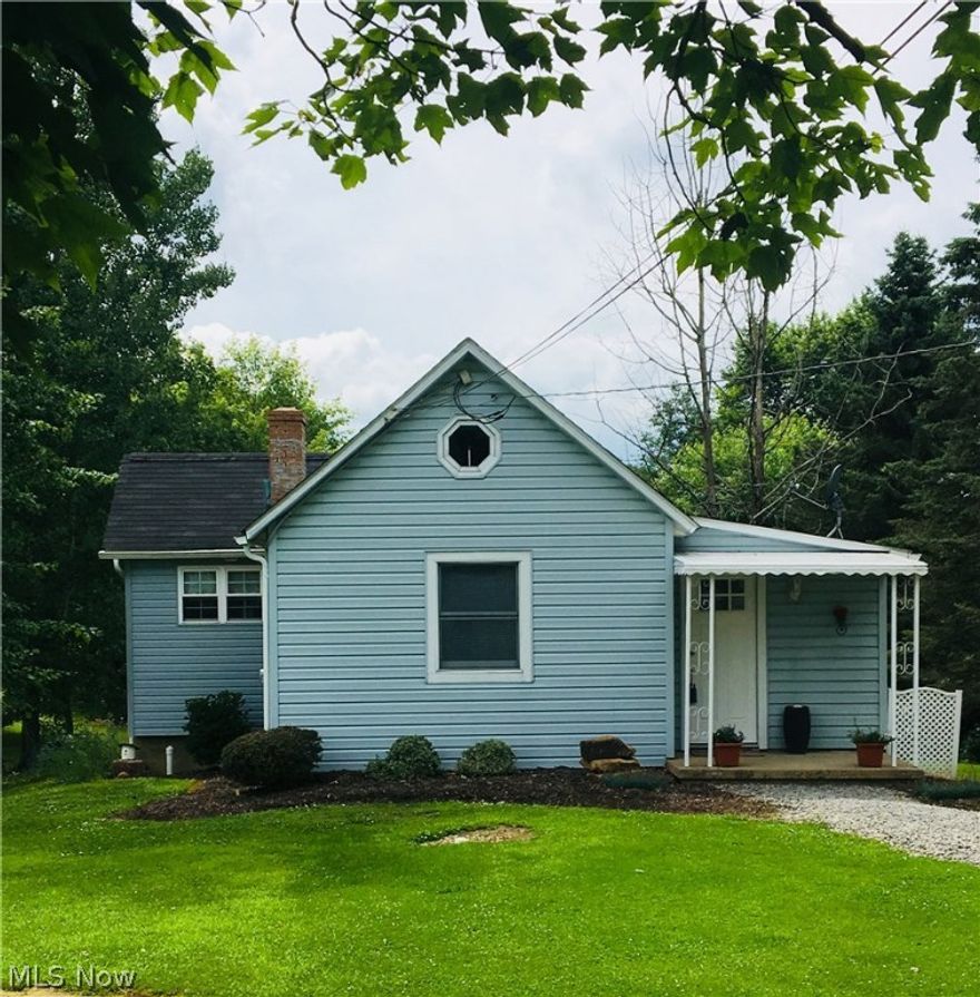 Completely adorable one bedroom bungalow in New Middletown Village. Amazing updated bathroom with soaking tub and floor to ceiling tiled shower. Basement has full bath and door that goes out to the beautiful back yard. Newer shed for all your storage needs.
