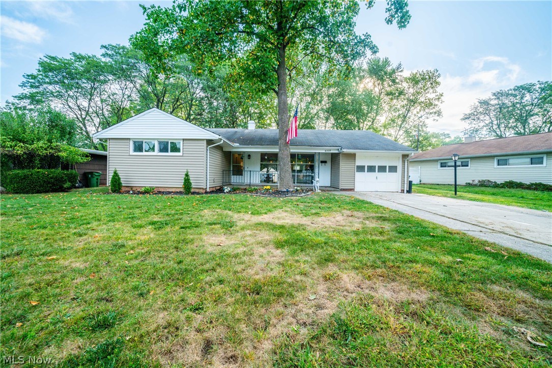 Come home to this updated Mid Century Modern Ranch in Parma Heights. This home offers a great open floor plan that has been updated and is following the on trend decor. The living room features a wall of windows and a great wood accent wall. The kitchen has been completely updated and is open to the living room and dining room which is great for entertaining. The laundry room is located off the kitchen and can serve as a mudroom as well from the attached garage. The family room is full of windows and is a great place to unwind after a long day or to start your day with a cup of coffee. The bathroom has been updated and features a granite counter. 2 nice sized bedrooms offer plenty of storage. The 3rd bedroom is quite large and offers a ton of closet space. The backyard of this home has been fenced in and the home is located on a cul-de-sac. Call your favorite Realtor today for your own private showing of this charming home.