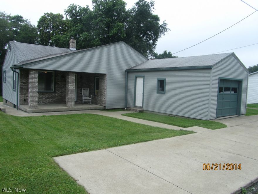 This is the one your have been waiting for!  This clean 3 BR home is a single level floor plan  with covered front and rear porches, single attached garage with paved apron, and smooth level sidewalks to minimize trip hazards. All appliances in the kitchen with ceramic tile floor.   The clean and painted basement includes the washer and dryer.    Seriously this is the one you have been waiting for.