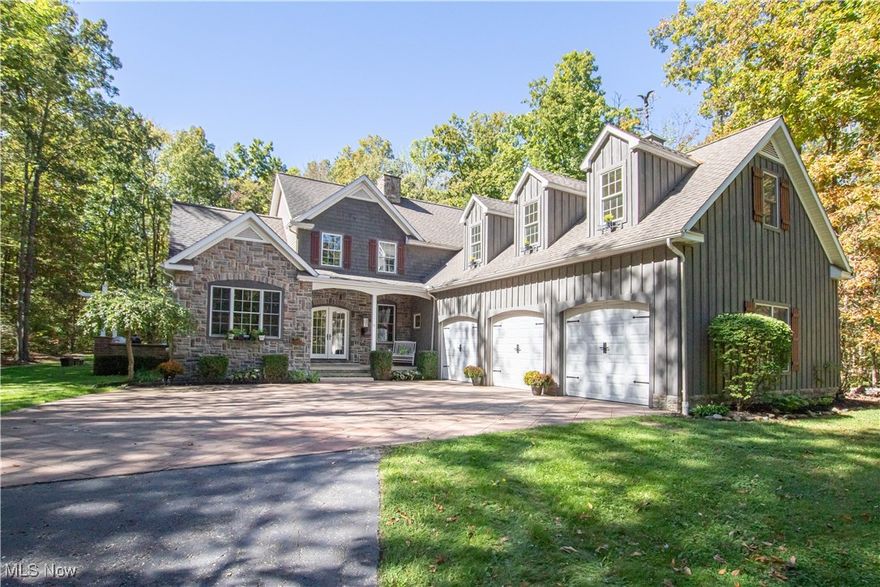 At the end of a serene cul-de-sac, framed by nearly eight acres of natural beauty, awaits a retreat that feels worlds away
yet close to it all. 10770 Locust Grove is more than a home—it’s an experience, designed to blend everyday comfort with
the luxury of resort-style living. The heart of the home is a light-filled great room where soaring ceilings and a woodburning stove create a warm, inviting atmosphere. The chef’s kitchen, beautifully upgraded, invites gatherings that flow effortlessly from cooking to conversation. A first-floor master suite offers a private sanctuary, while the expansive finished basement provides endless opportunities—whether for recreation, relaxation, or an additional bedroom. An enclosed sunporch ensures year-round enjoyment of the changing seasons, bringing the outdoors in. Step outside and discover an entertainer’s dream. A multi-tier deck leads to a fully equipped outdoor kitchen, a bubbling hot tub, and even an outdoor shower—thoughtfully crafted spaces for hosting unforgettable evenings or savoring quiet mornings surrounded by nature. With a three-car garage and the unmatched privacy of its cul-de-sac setting, this Chardon estate is as functional as it is inspiring. Here, every detail is designed to elevate daily living into something truly extraordinary. Priced to sell- take a tour before it's gone.