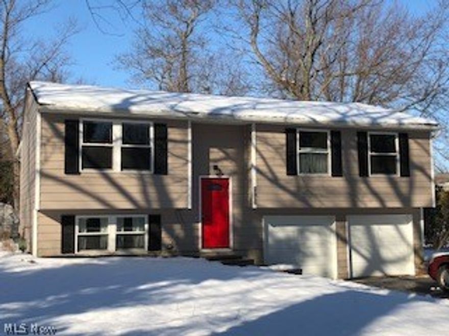 If your looking for your new home this  Spring,  it just hit the market.  The home offers a complete remodel.  3 bedrooms, living room, dining room which leads to screened sun room. large kitchen with tons of cherry cabinets.  Concrete counter tops. New dishwasher, new refrigerator.  New flooring through  entire home.  Main bath has double vanities and tastefully designed.  Lower family room with additional smaller space for office or storage. full bath and large laundry room.  Two car attached garage with new doors.  so many upgrades here.  New finishes including  all new flooring, trim, doors, roof, driveway,  So much more