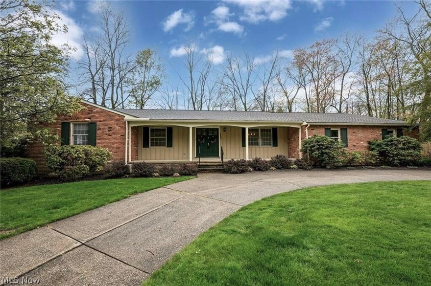 Desirable Mayfield Village ranch with 3 bedrooms including an owners suite located near Cleveland Metropark entrance, Grove outdoor amphitheater, community pool & playground, library and much more! This spacious home includes double door entry and welcoming foyer with closet. There is a large great room with floor to ceiling bow window overlooking private backyard. The family room features hardwood floors, skylight, fireplace, beamed ceiling and recessed lighting that is open and flows into kitchen area with slider to additional outdoor living space including large deck. Kitchen features cherry wood cabinetry, recessed lighting & pantry, all appliances stay. Adjacent to the kitchen is a convenient 1st floor laundry room and 1/2 bath. Enjoy the formal dining room that could also be used as a home office if preferred. Three generous size bedrooms, all having more than one closet, include an owners suite with dressing room and updated bath with shower. The basement is finished and features a wet bar with additional storage spaces and includes a workshop/utility area. Garage is an oversized 2-car attached garage with pulldown ladder attic storage and large turnaround drive with ample parking. Home is located in a wooded area with relaxing backyard featuring oversize deck, perfect for gatherings, a storage shed is also included. Pre-listing home inspection by Signature Home available to buyer for review. Contact listing agent directly for most accurate information and to schedule your appointment to view today!