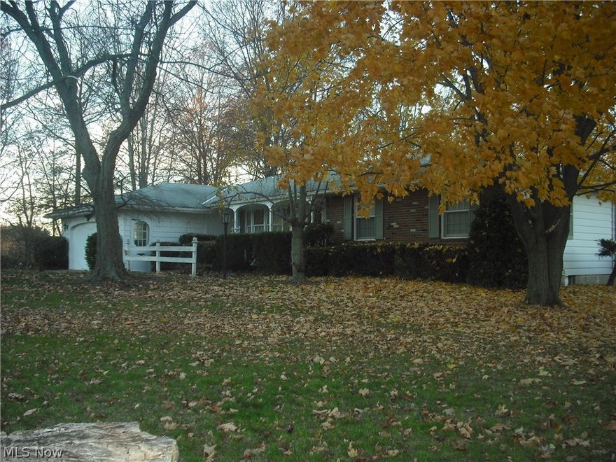 Free unlimited natural gas! New to the market for the first time. Don't miss out on this custom built, 2080 sq. ft., well maintained ranch with spacious rooms, large first floor laundry and plenty of closet space in every room. Features include high quality Pella windows, public water, central air and a full brick wall, gas-start fireplace in the family room that opens to a heated Florida room for a sprawling open floor concept.  The dry basement  has poured walls with unlimited shelving for all your endless projects.   In the back, there is a 2816 sq. ft., 2 story barn with a hay loft, granary and 320 sq. ft. attached canopy porch. Dual pumps can be reconnected to provide pond water to the barn that originally housed dairy cows.  The majority of the barn floor is dirt with 1/4 concrete.  This one-owner home sits back 500 ft. from road on 3.3 serene acres speckled with fruit trees, a garden area and a pasture for your horses along with a chain link fenced area for pets that grants acce