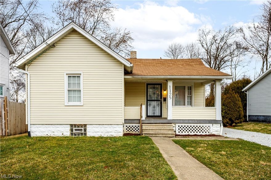 Welcome to 1125 Wiley Road in Akron. Here you will find a cute ranch style home with vinyl siding and a two car garage, plus a covered front porch to enjoy summer nights on. Many updates make this a great home to own instead of paying rent!  Three nice size bedrooms with new carpet '24, kitchen redone with freshly painted cabinets, new large farmhouse sink with cutting board/strainer and hand held faucet , new Formica counters, new stainless steel gas stove  and refrigerator. Bath has been updated with newer vanity and shower surround. Spacious 18x15 room in basement that could easily be converted into a man-cave or additional family room.  Roof approx 10 years. Vinyl, tilt-in windows 5 years. HWT 3 years. Come and check out 1125 Wiley Road in Akron today!!