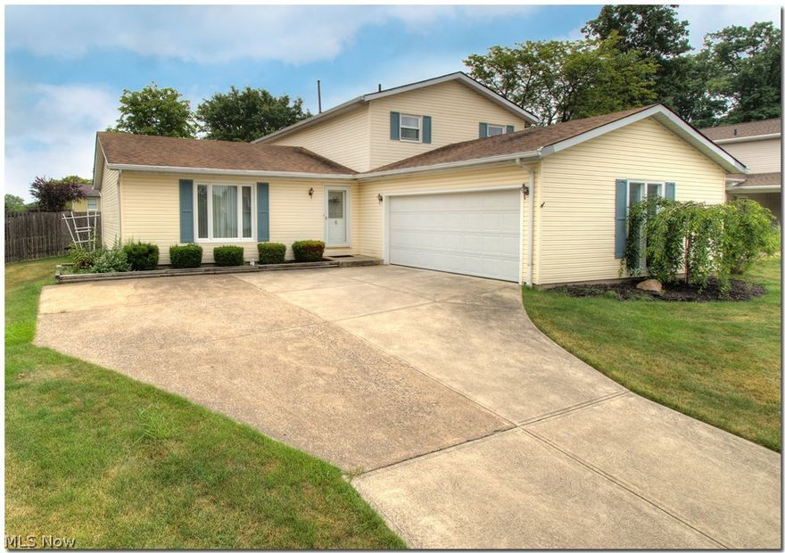 Move right into this updated split level home in Brunswick.  Exceptionally spacious.  Formal living & Dining Rooms.  Newer bamboo laminate floors from foyer through kitchen & family room.  Talk about the kitchen!  Updated in December of 2015, it boasts crisp, white cabinets, stainless upgraded appliances and granite countertops.  Open to the Family Room which boasts bamboo laminate flooring and a full-wall fireplace.  Sliders lead to the inviting patio.  Down the hall is a large bedroom and a full bath.  Ideal for a teen, in-law or office suite.  The second floor has a Master Bedroom and updated bath, two additional bedrooms with bamboo laminate flooring and a third full bath.  The basement features a large laundry room, a craft or play room and a workshop.  Great backyard is fully fenced with 6' privacy fence and an 8x10 shed.  Perfect for keeping the kids and dogs in!  Updates include roof, vinyl siding, K-Guard Gutters (Lifetime Warranty), Andersen Patio and Entry doors, Chimney che