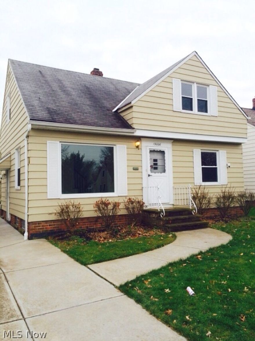 Welcome to Garfield Heights!  Come see this very nice and freshly painted 3 bedroom, 1 bathroom Cap Cod that features an updated Eat-in-Kitchen, Newer Windows, beautiful hardwood floors in the main level bedrooms, detached 2-car garage, central-air conditioning, partially finished basement and glass block windows in basement and bathroom.  This home is a 5 minute walk from Garfield Mall, local restaurants, convenience stores, public transportation, nearby highway and more!  A must see!  Schedule your appointment today!