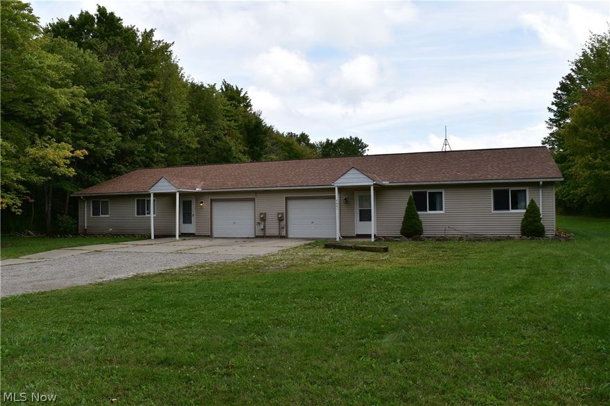 Great Investment Opportunity! Own this Duplex set on 6.77 private acres! Sprawling Ranch includes 2 identical units each with over 1500 sqft of living space, 2 Bedrooms & 1.5 Baths, Eat-in Kitchen open to large Living Room with French doors to private patio, Large Laundry/Utility Room with access to 1-car attached garage each. Updated with freshly painted interior, newer wood laminate flooring and new carpet in south side unit.. Set on deep wooded lot. Riverside schools.