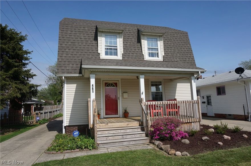 Darling Colonial with great curb appeal. Covered front porch entry way with sitting area to relax. Spacious rear yard with newer two and half car detached garage. Rear yard features a 12 x 9 deck with an adjacent concrete patio area, as well as second story deck off bedroom hallway. Raised garden beds ready for you choice of flower or vegetable garden enjoyment. Add a driveway gate and rear yard is full fenced. Interior features living room with fireplace wall showcasing mantle, mirror, cabinets and shelving built ins. Formal dining room adjacent to kitchen. Large working kitchen with wood laminate flooring, double sink, and ample counter and storage space. Kitchen appliances to stay with home. Rear mudroom entrance to kitchen. Two spacious bedrooms with great architectural lines and good closet space. Full bath is updated, and common hallway landing area has built ins and second story deck access. Full waterproofed basement with lifetime warranty. Numerous updates by current owner inc