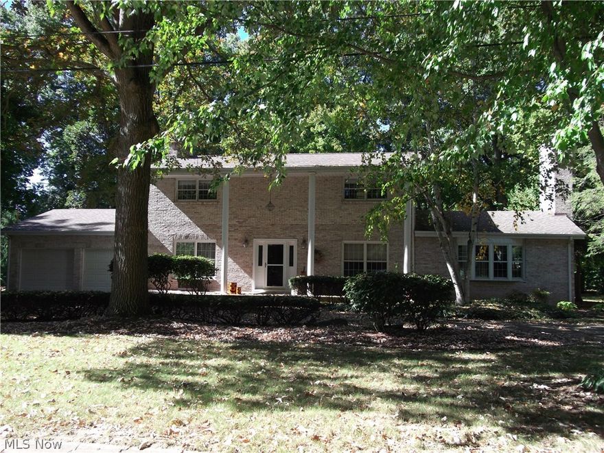 Extraordinary 3 bedroom 4 bath All Brick Beauty with 4 brick fireplaces!  Features huge Great Room with vaulted wood & beam ceiling, gorgeous fireplace and sliding doors to covered back porch and patio, Master Suite with full bath, walk in closet, fireplace, and balcony, Newer Eat-In Kitchen with all stainless steel appliances, Hearth Room for casual or formal dining,  All Bedrooms have gorgeous hardwood floors and California Closet systems, Family Room on lower level with fireplace and restored barn beams. Updates include newer roof, hot water tank, boiler/furnace, and water softener. This home is absolutely stunning!