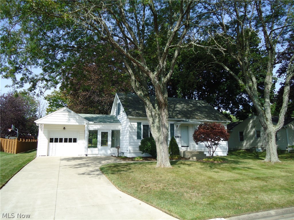 Don't miss this one!! Move-in condition 3 Br 2 bath home on quiet, dead-end street. Updates include remodeled kitchen(2016), remodeled bath(2016), furnace(2010), windows and spacious rec room and 2nd bath in basement. Hardwood floors on 1st floor. Freshly painted neutral decor throughout. 3 season porch overlooking beautiful yard with storage barn. A place you'll love to come home to! Call today for your private appointment.