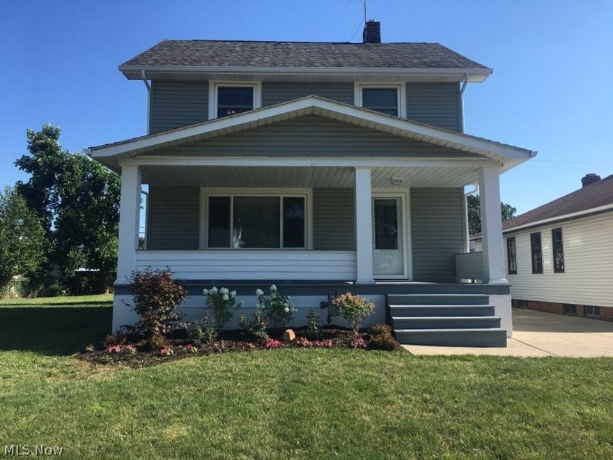 This 3 bedroom 2 FULL bath Gorgeous Parma Colonial is updated & upgraded. An amazing opportunity, it includes an additional adjoining lot. TWO LOTS for the price of one! Minutes to 480 and 71. Large and friendly covered front porch. STUNNING kitchen with GRANITE, double sinks, & CHERRY MAPLE Cabinets. Built-ins upstairs and HARDWOOD FLOORS add character and charm throughout. The whole home is painted in today's colors and most rooms have ceiling fans. The clean and bright basement was waterproofed in 2005 & includes a finished REC ROOM w/ new carpet, a laundry room w/ washer & dryer staying, and 2nd full bath. The walk up 3rd floor attic could be finished for even MORE space.. Updates and upgrades include new stove, newer LG fridge, replacement windows, main bathroom beautifully renovated, newer HVAC 2012 w/ Hi Efficiency Furnace 95%, vinyl siding in 2012, hot water tank 2016, updated electric, and a roof touch up this year. Home Warranty also provided!